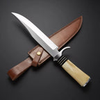 Knife with a brown leather sheath on a dark background