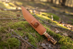 Leather sheath included for protection and portability.
