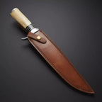 Knife with wooden handle and leather sheath