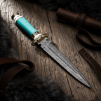 Fixed blade Damascus knife with turquoise and brass handle