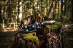 Knife with black sheath and deer antler handle